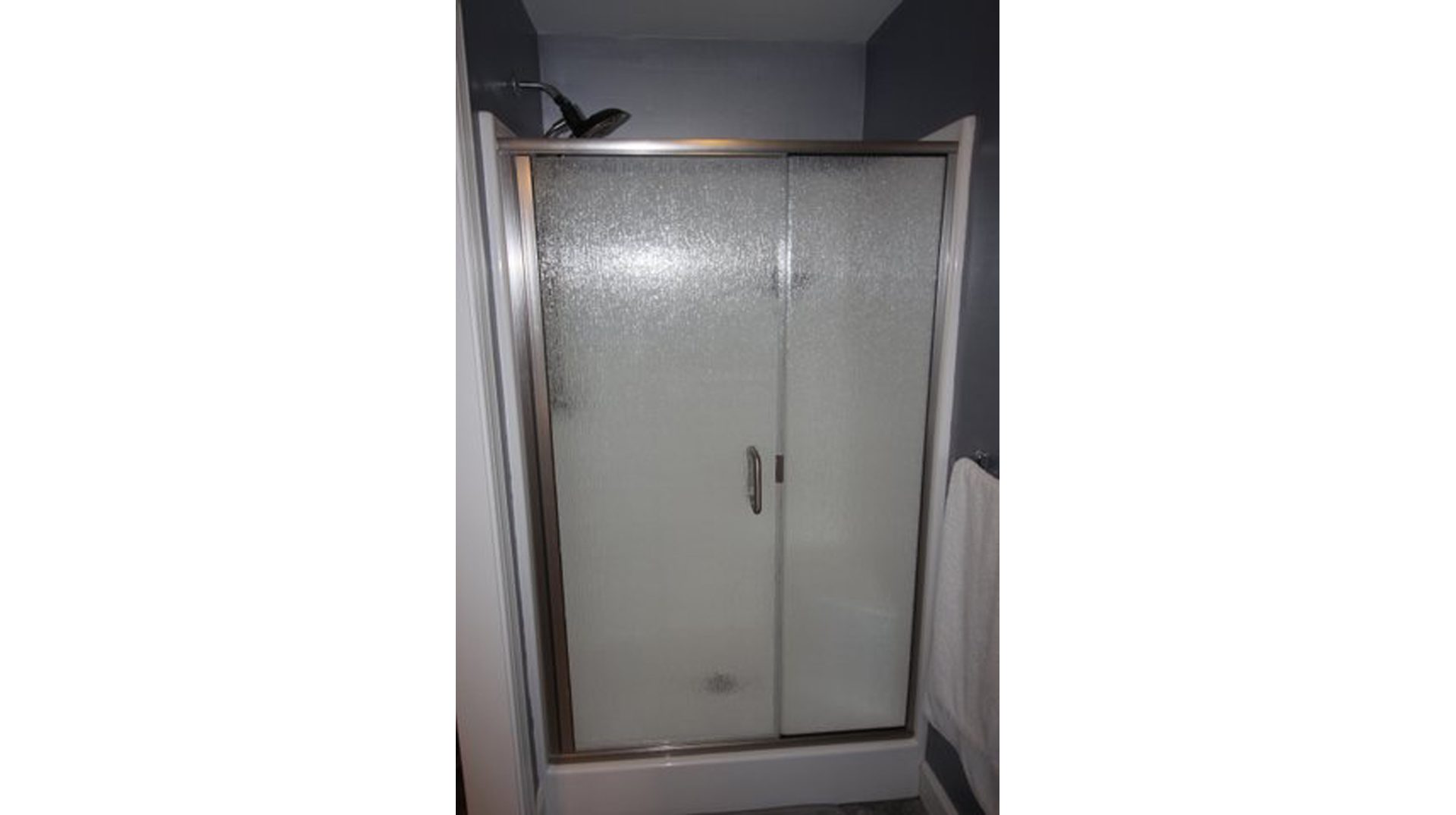 Semi-frameless shower door